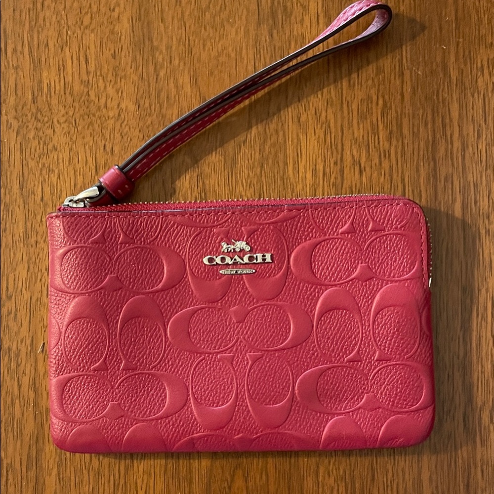 Coach Embossed Pink Wristlet